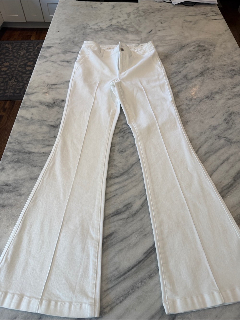 AE next level stretch super high rise flare cool white bnwt size 4